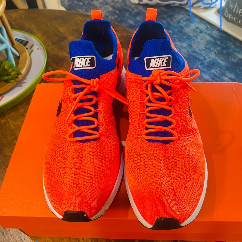 Mens Nike running shoes. NWOT. Size 11. Fluorescent orange and blue.